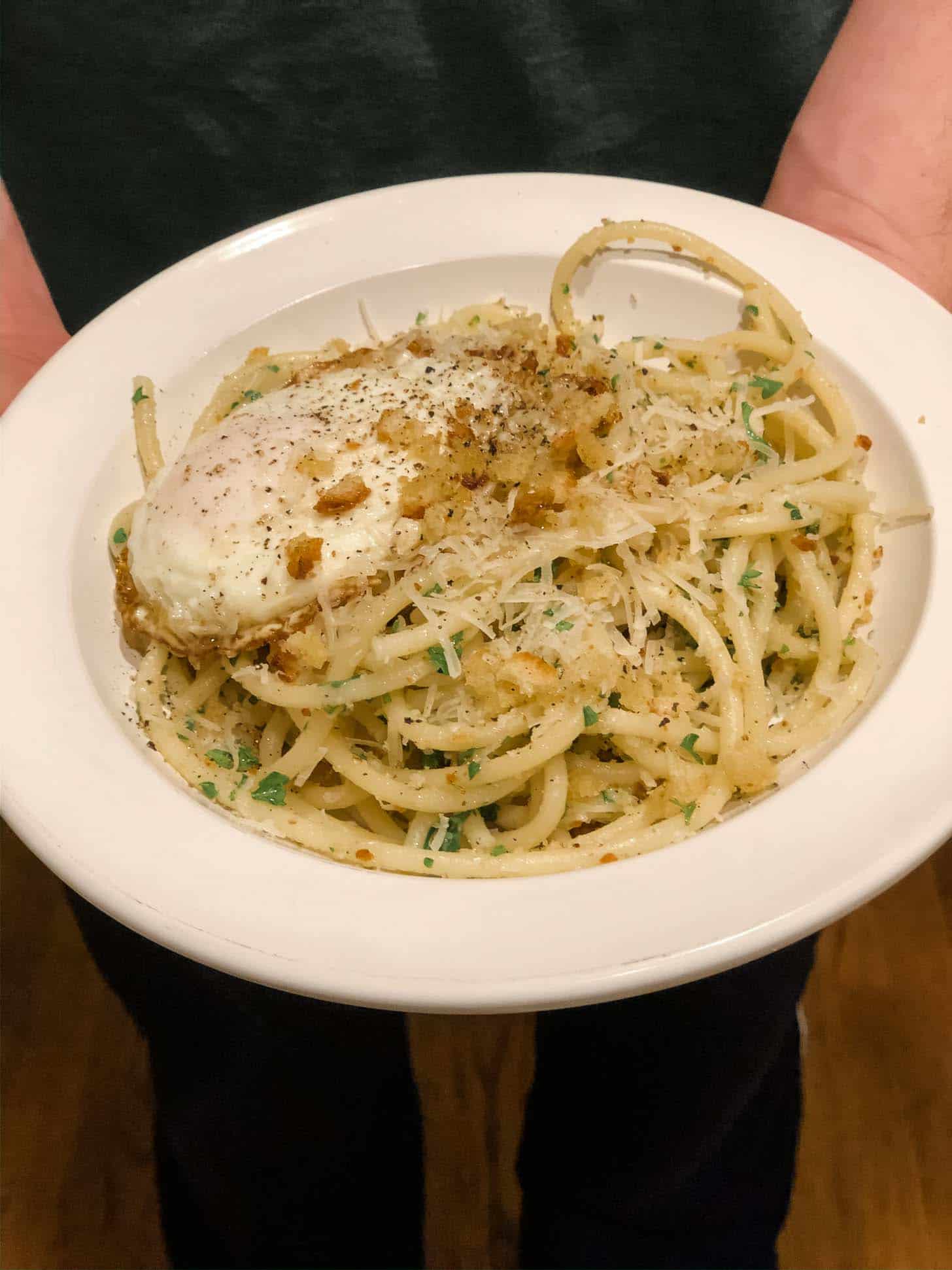 spaghetti salerno in a white bowl