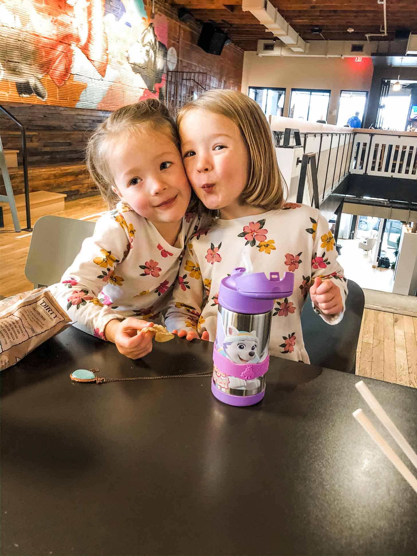 two little girls out to eat lunch