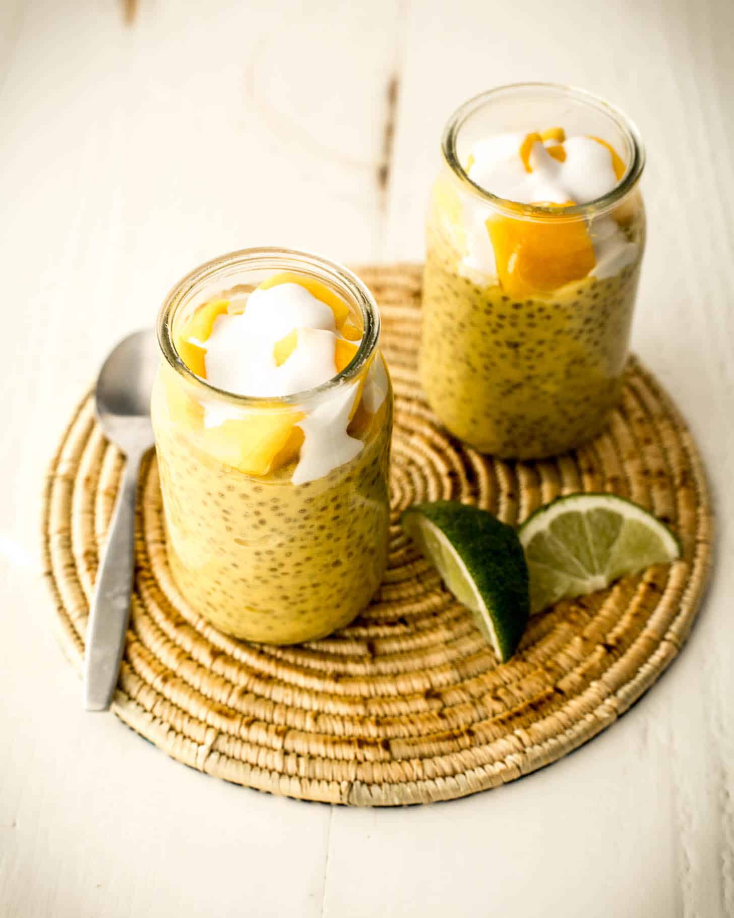 mango chia seed pudding in glass jars