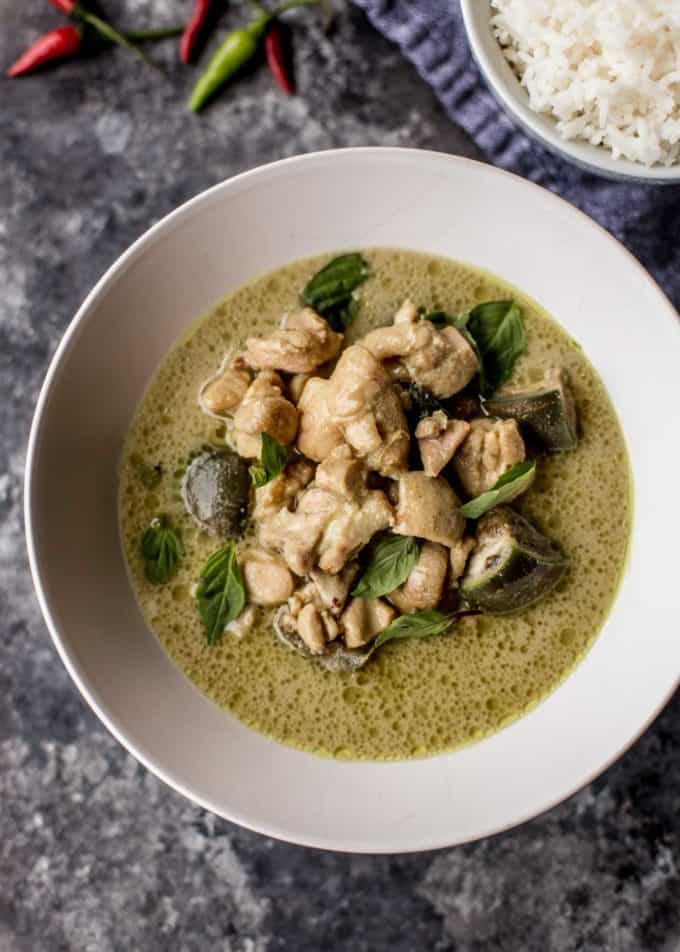 thai green curry in a white bowl