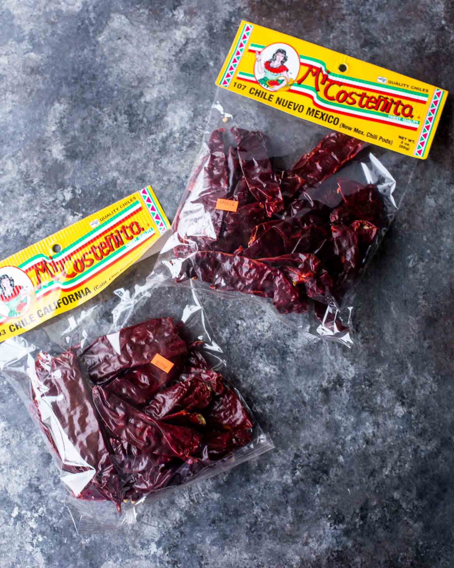 dried chile peppers on a grey countertop