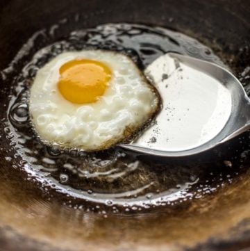 a fried egg in a wok
