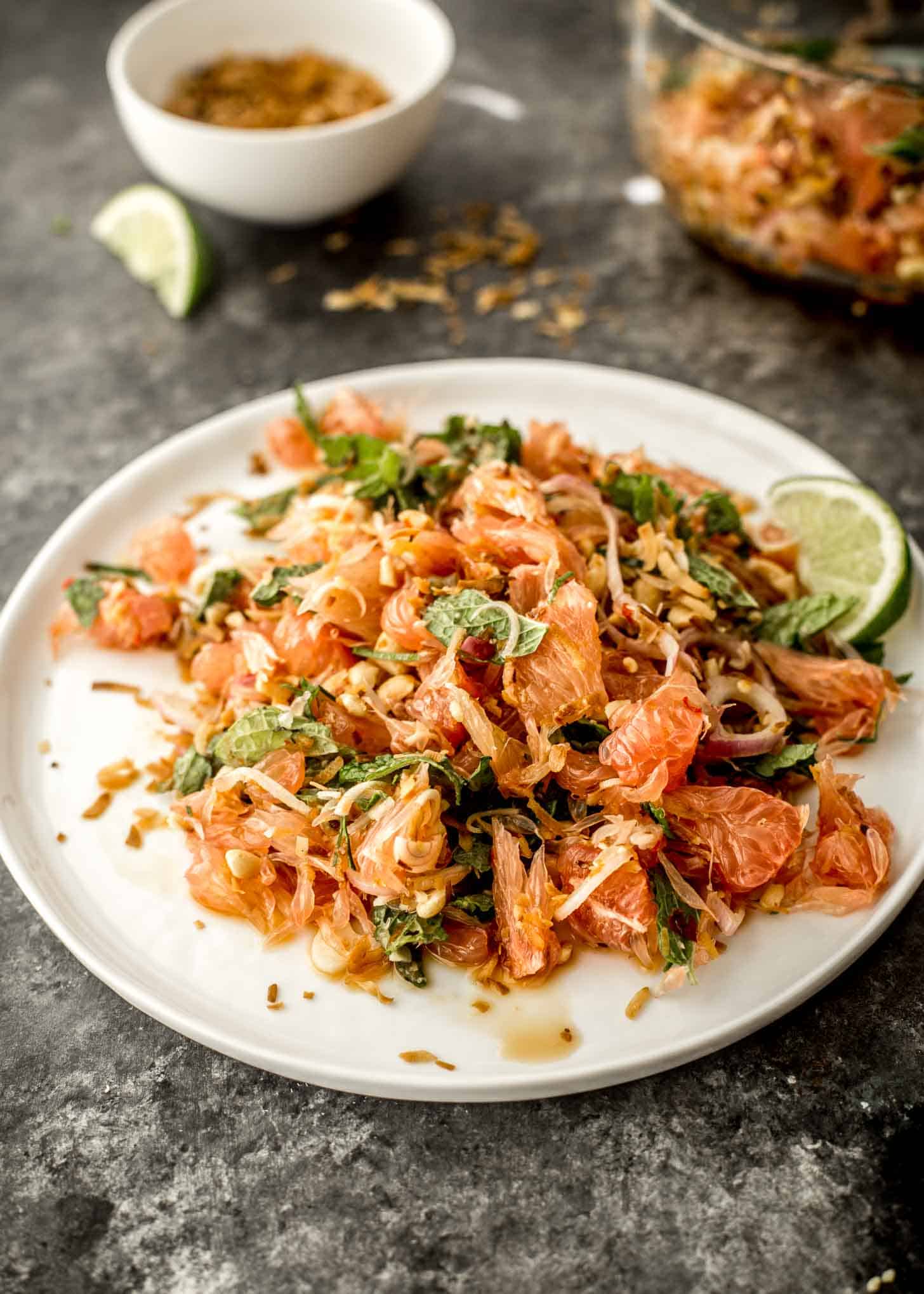 thai pomelo salad on a white plate