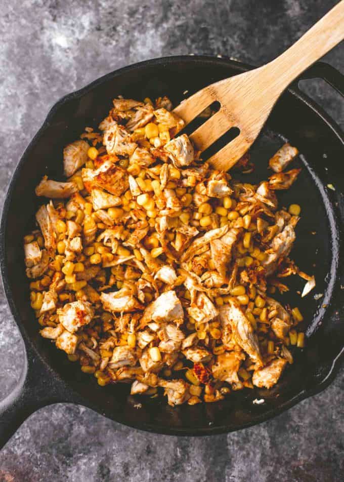 chicken and corn in a cast iron skillet