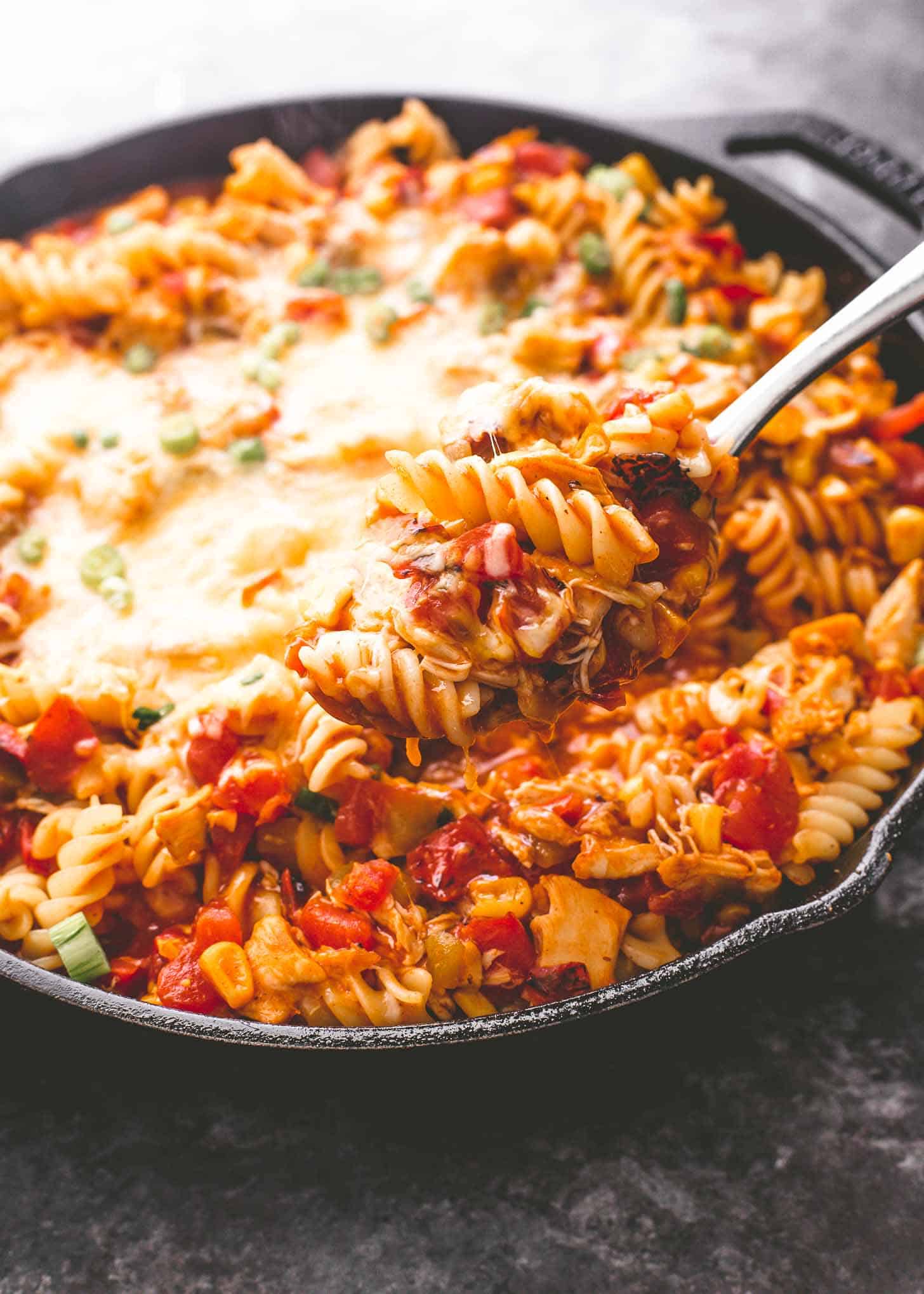 chicken enchilada pasta in a cast iron skillet