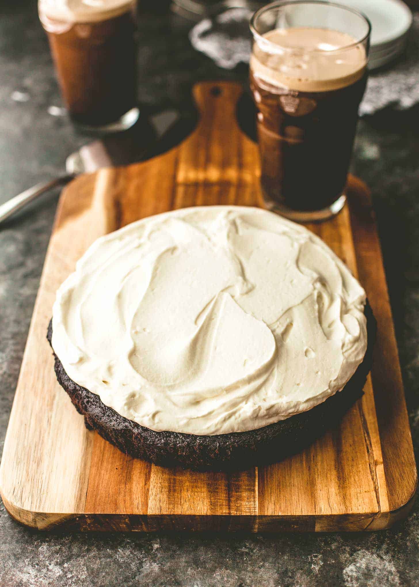 one bowl guinness chocolate cake on a wooden tray