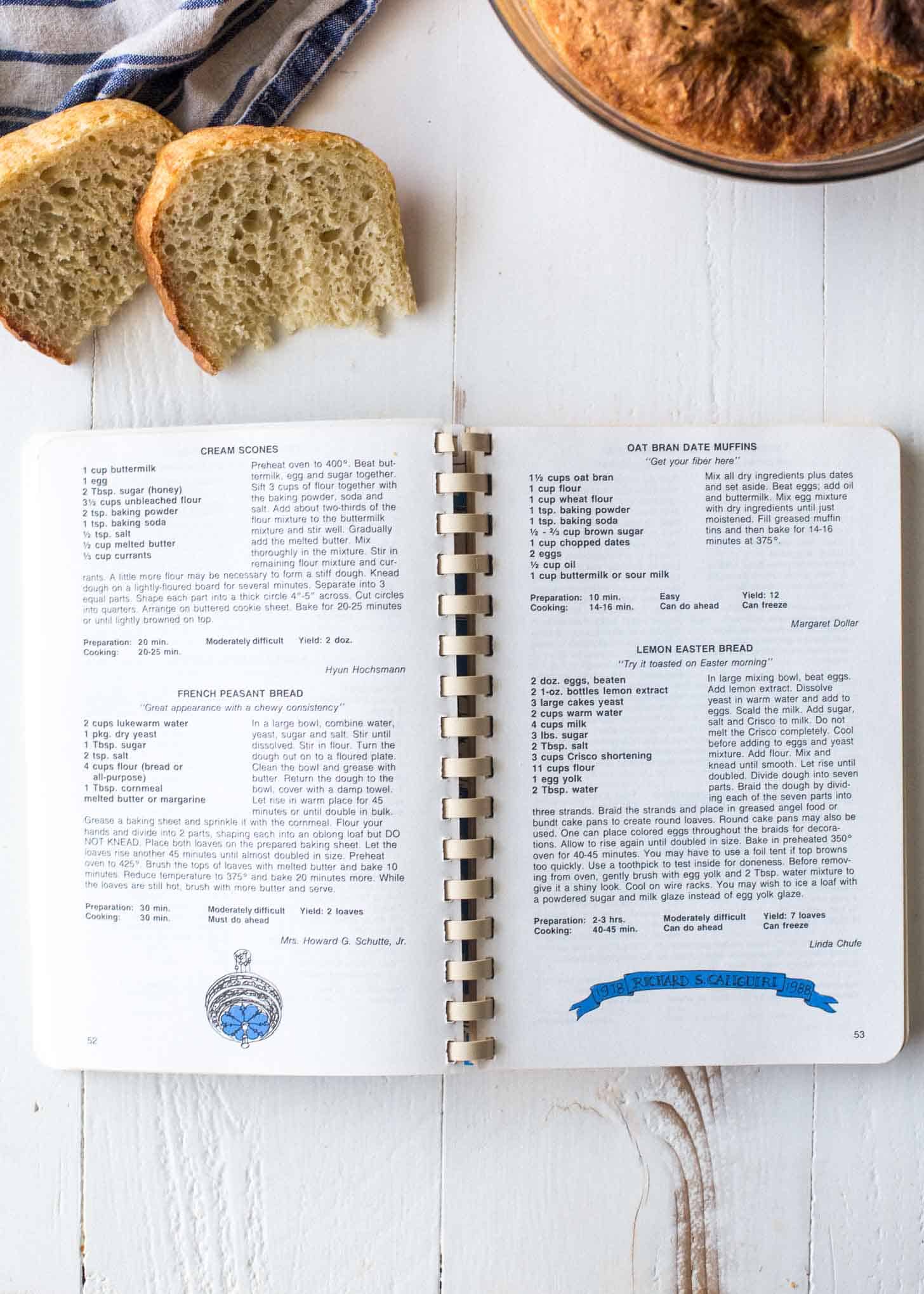 overhead image of a spiral bound cookbook open to a Bread recipe 