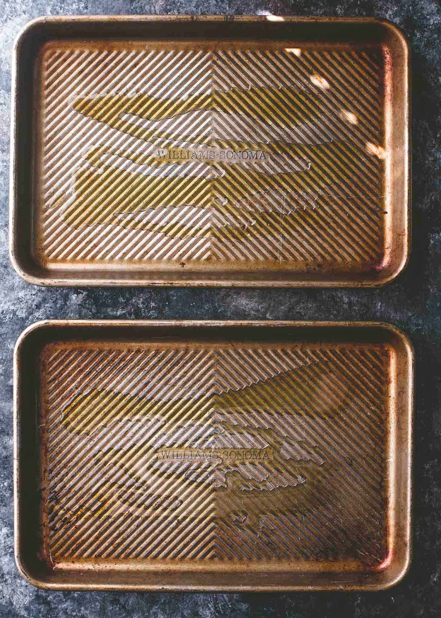 overhead image of sheet pans drizzled with olive oil