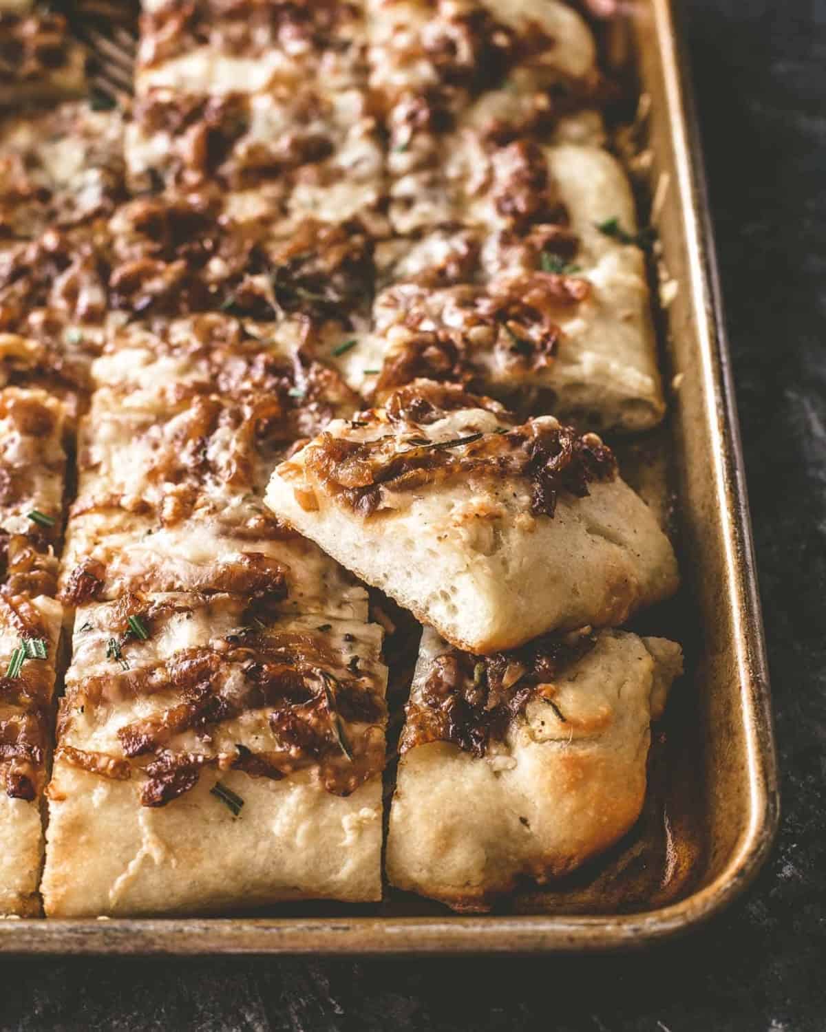 sliced pizza on a sheet pan