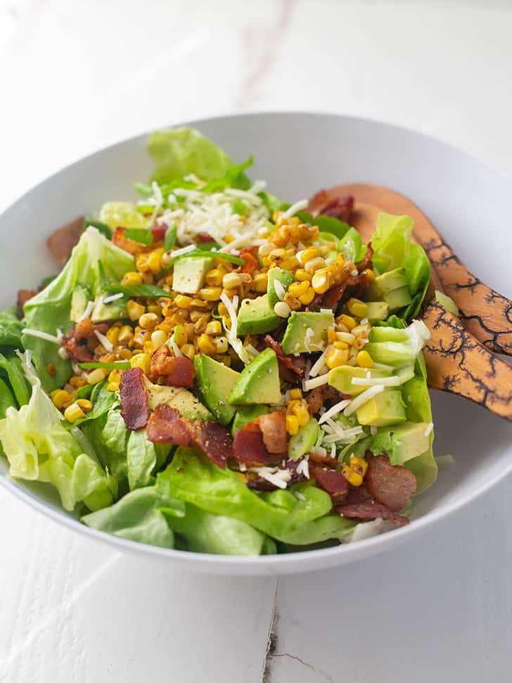 Bacon, Corn and Avocado Salad in a white bowl