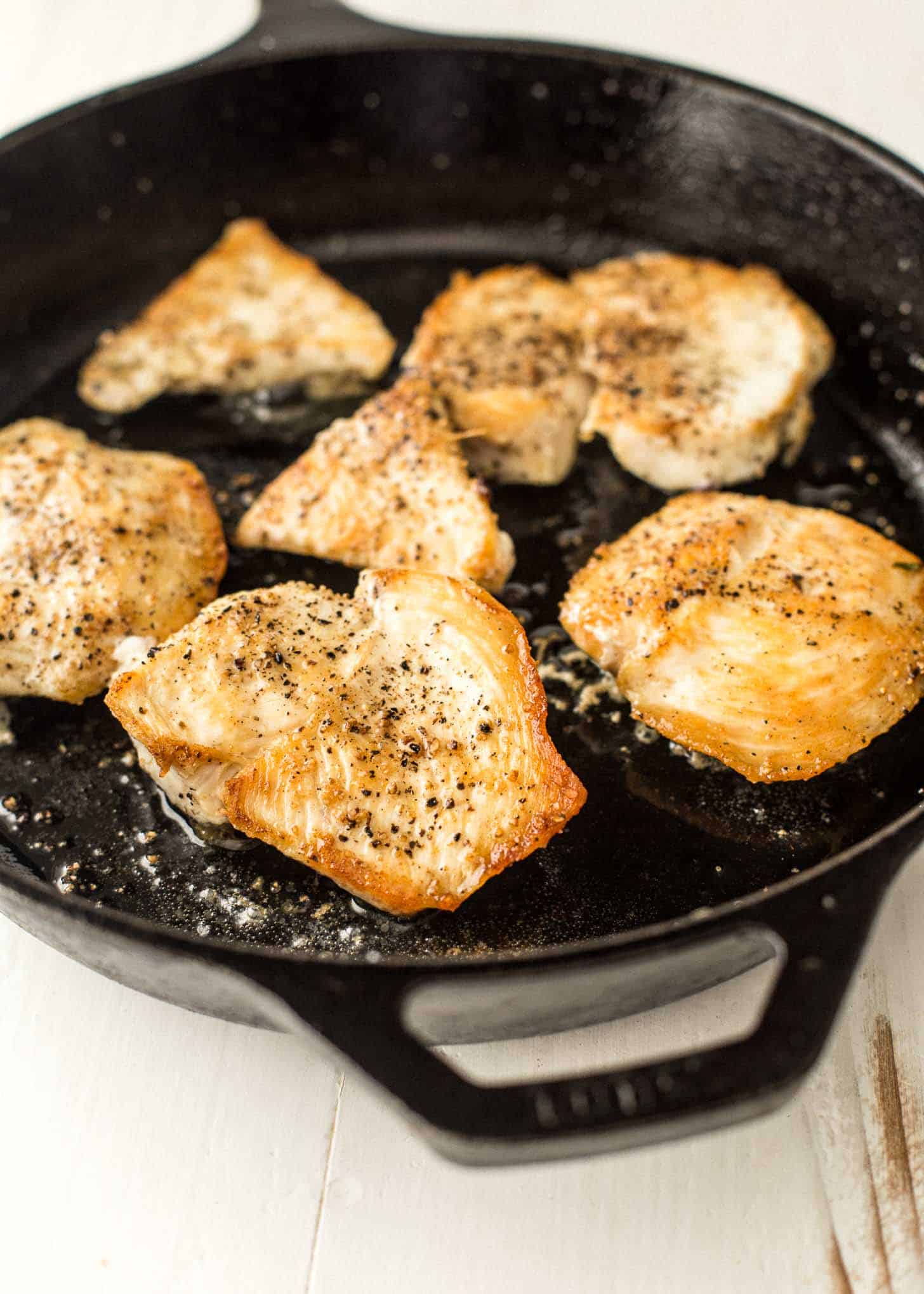 cooking chicken thighs in a cast iron skillet