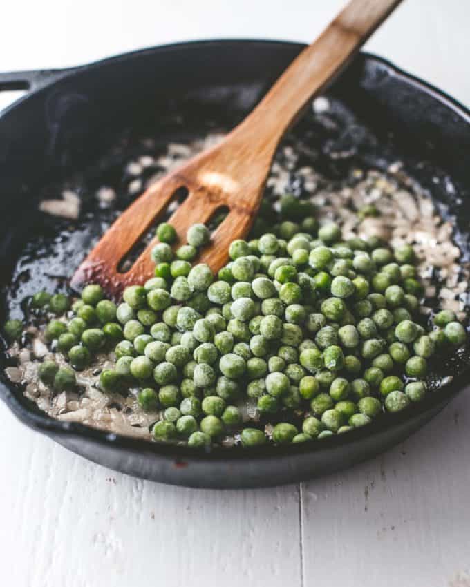 cooking peas in a cast iron skillet