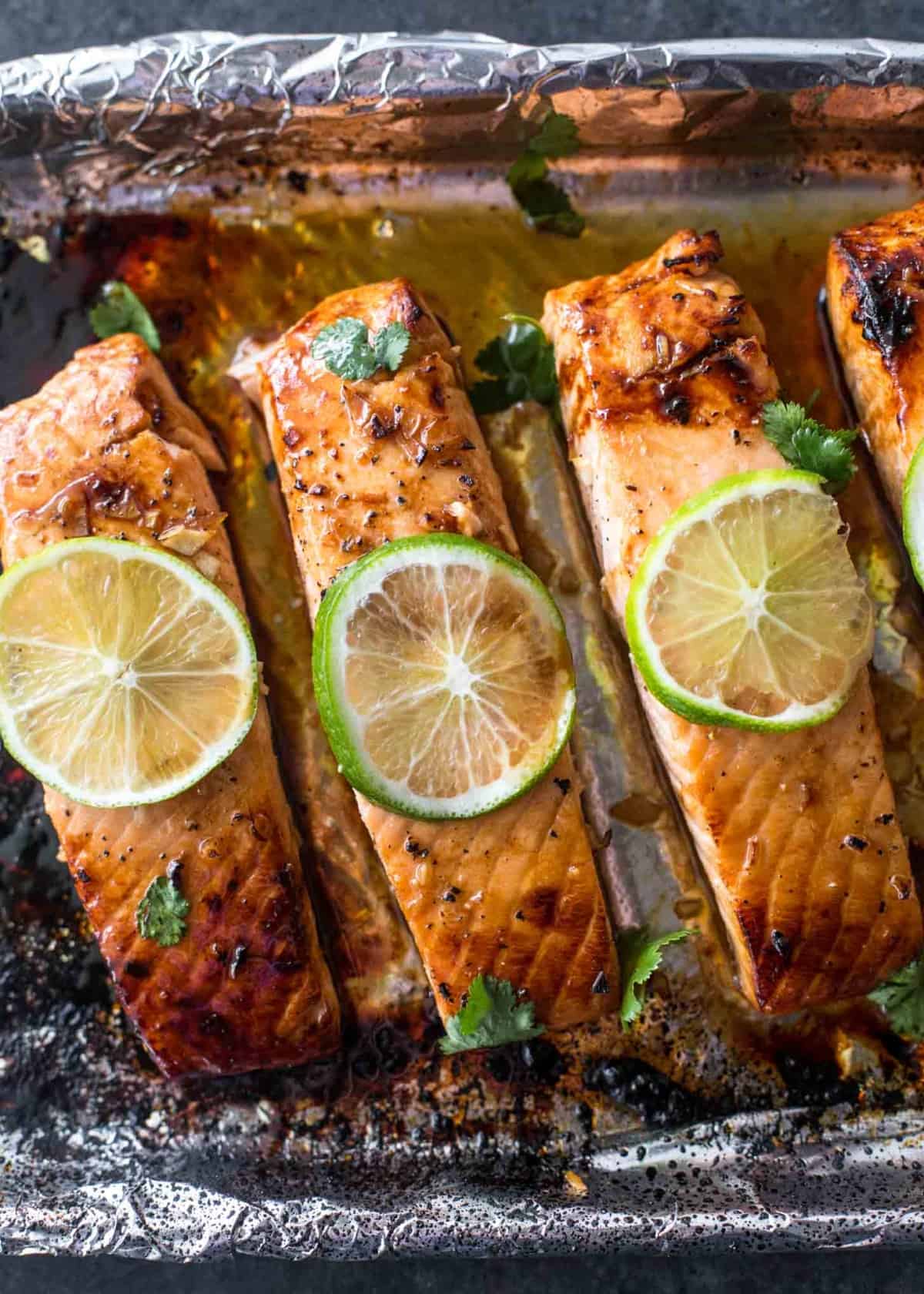 honey lime salmon on a foil lined sheet pan
