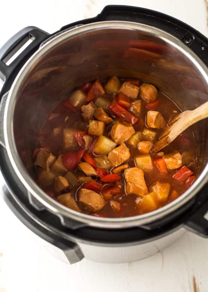 sweet and sour chicken in the bowl of an instant pot