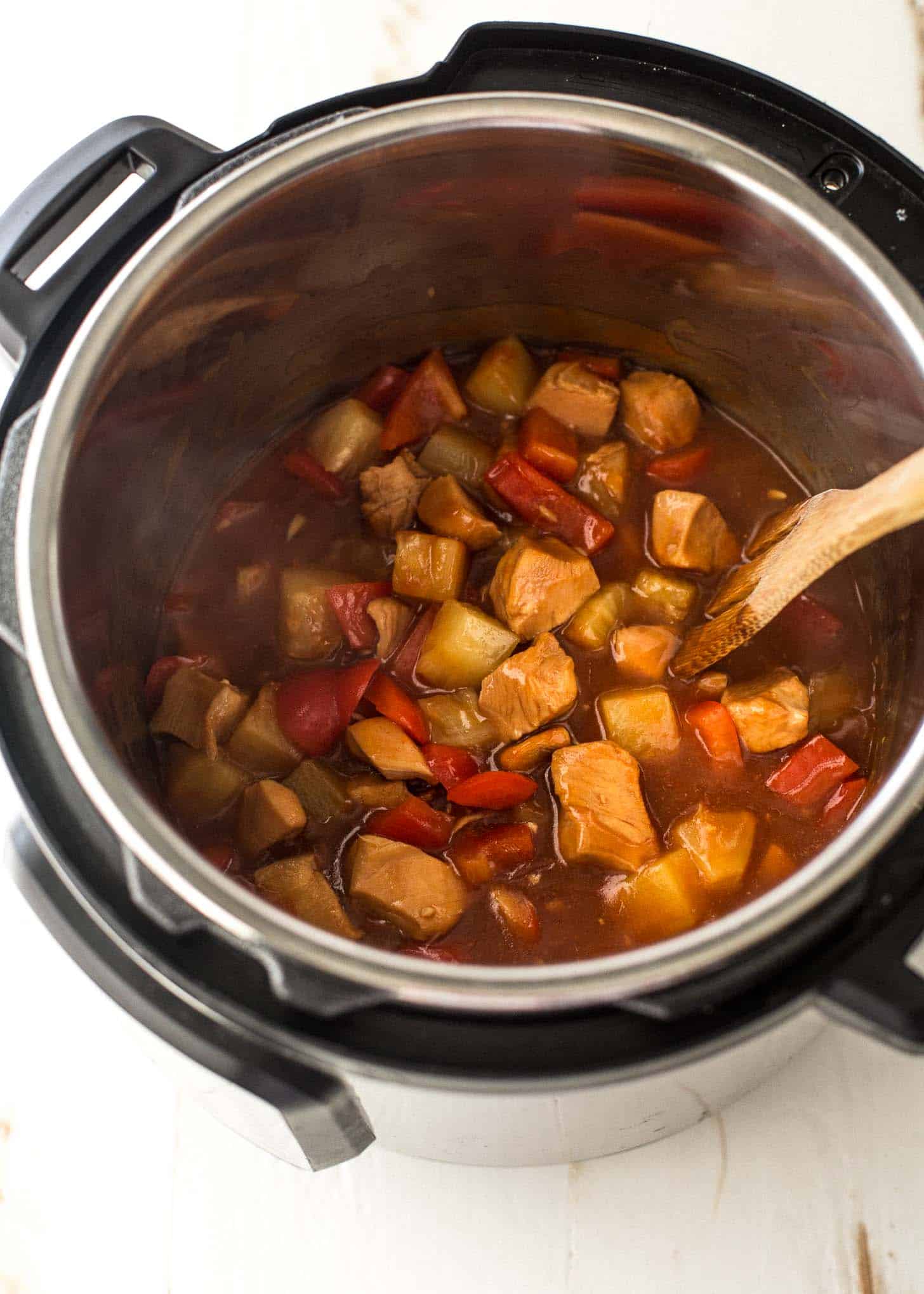 overhead image of sweet and sour chicken in the bowl of an instant pot