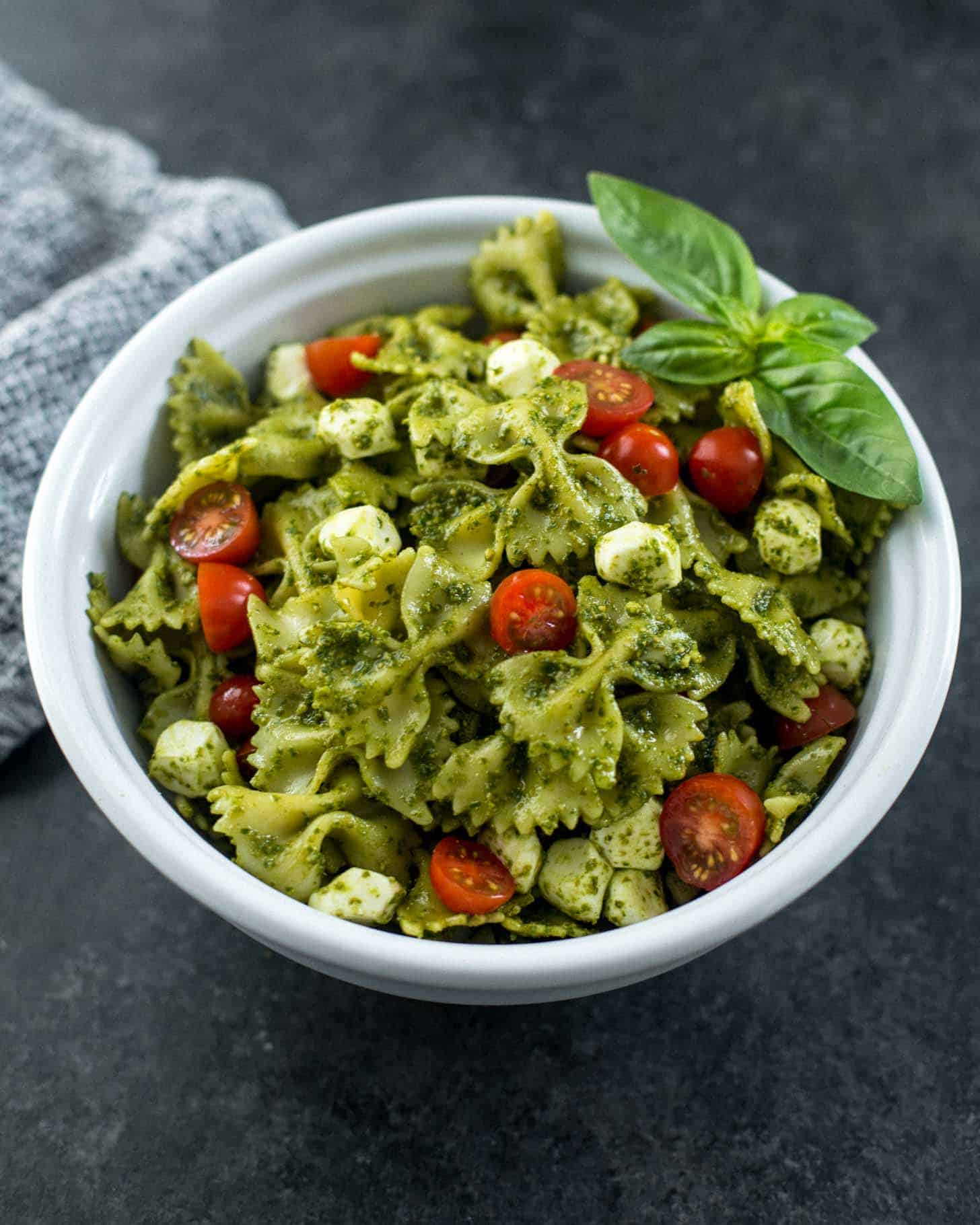 Pesto Pasta Salad in a white bowl