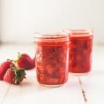 Homemade Strawberry Syrup in small glass jars