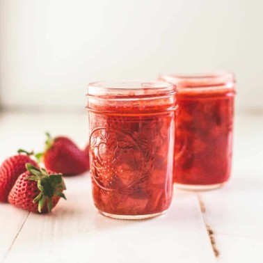 Homemade Strawberry Syrup in small glass jars