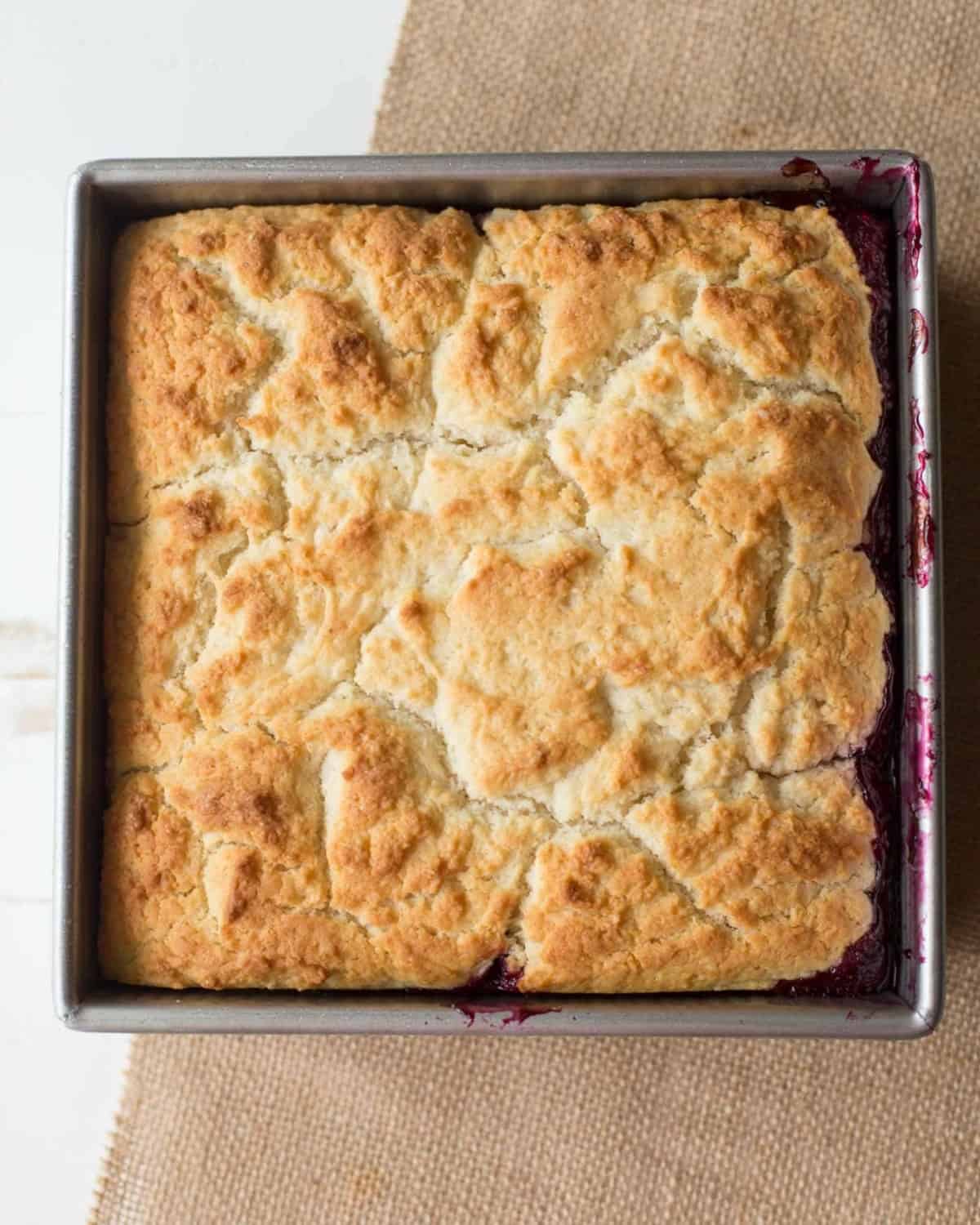 square baker with berry cobbler
