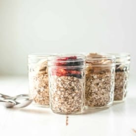 mason jars with homemade oatmeal on a white table