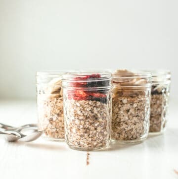 mason jars with homemade oatmeal on a white table