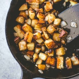 cooking potatoes in a cast iron skillet