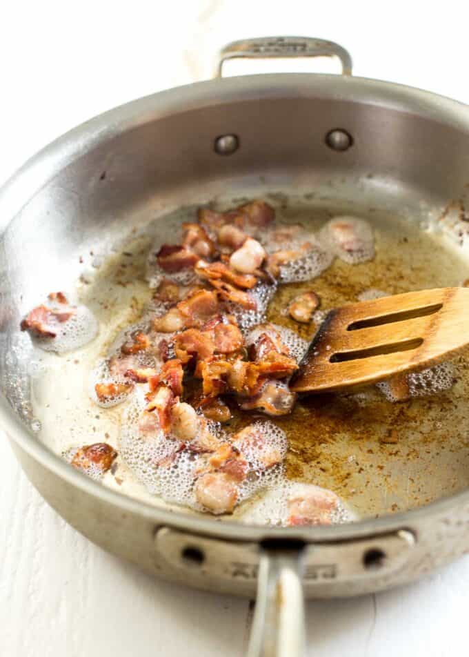 cooking bacon in a skillet