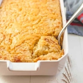 corn casserole in a white baking dish