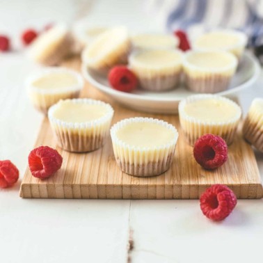 mini cheesecakes on a wooden board