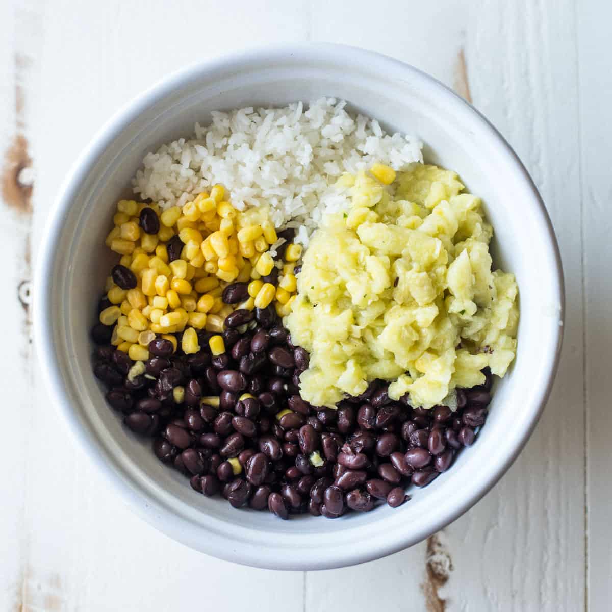 stuffed zucchini mixture in a white bowl