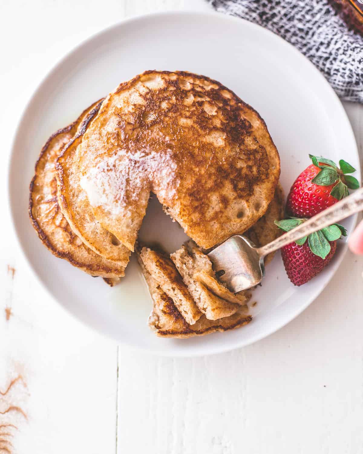 whole wheat pancakes on a white plate