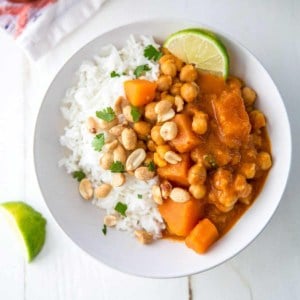 chickpea curry in a bowl with rice