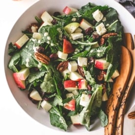 apple brie and pecan salad in a white bowl