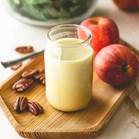 apple cider vinaigrette in a small glass jar