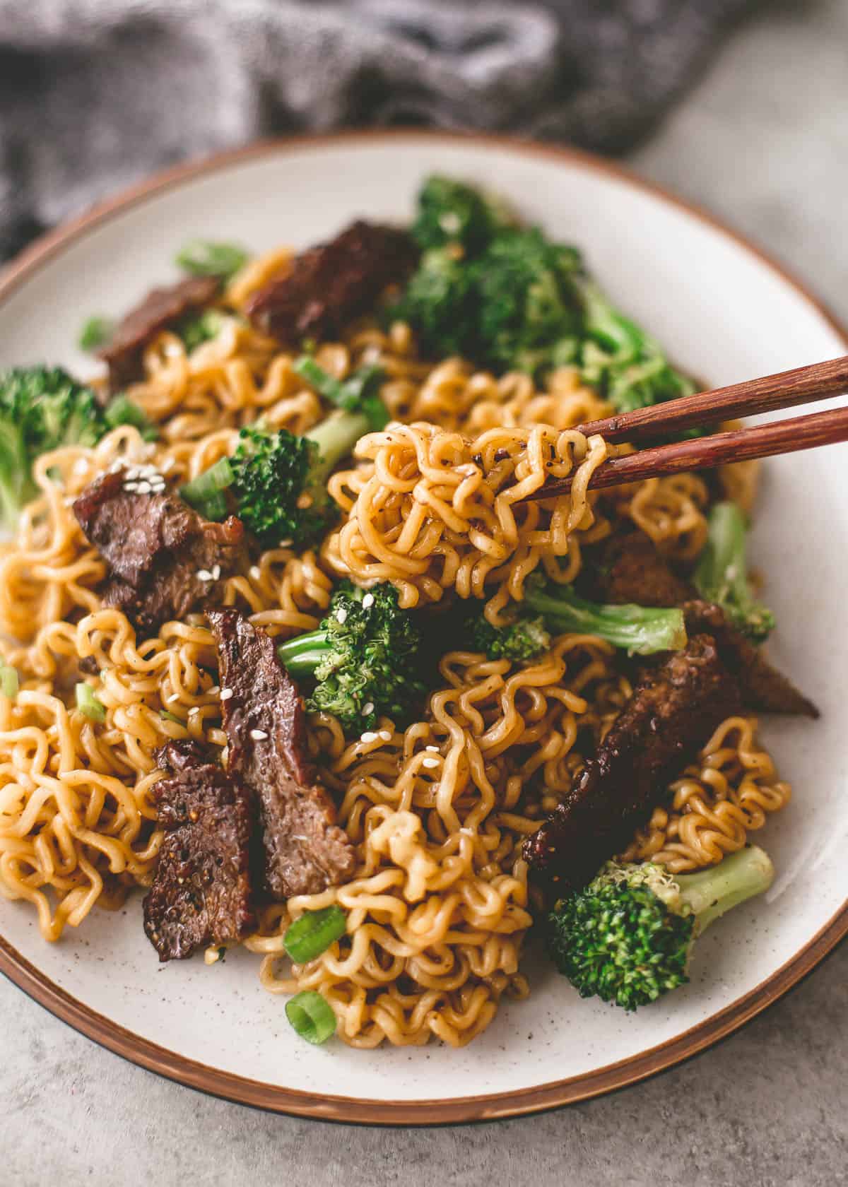 eating ramen stir fry with chopsticks