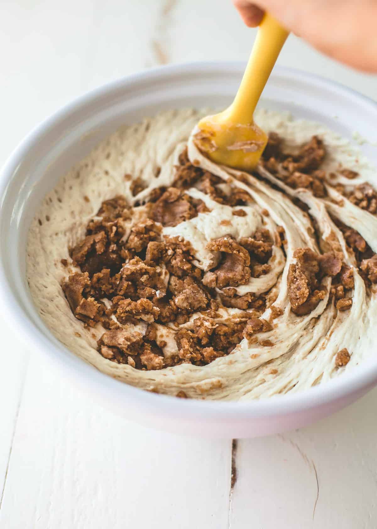 stirring streusel into dough