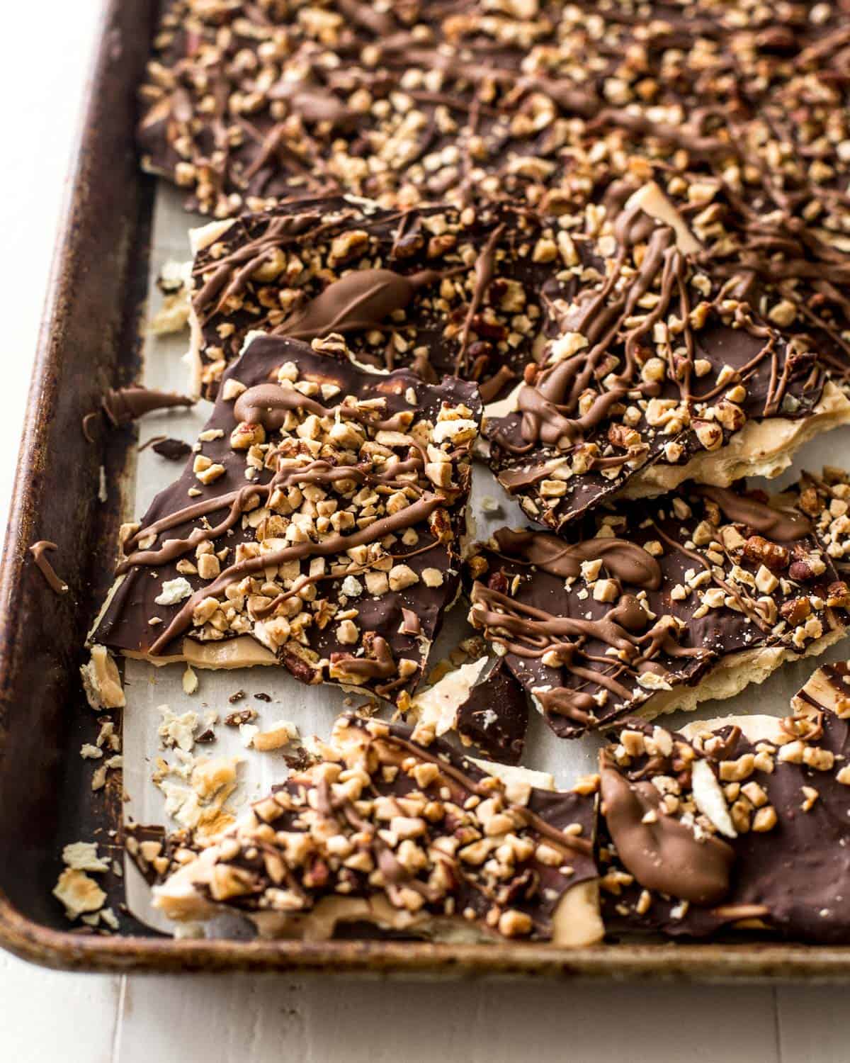 chocolate saltine toffee bark on a sheet pan