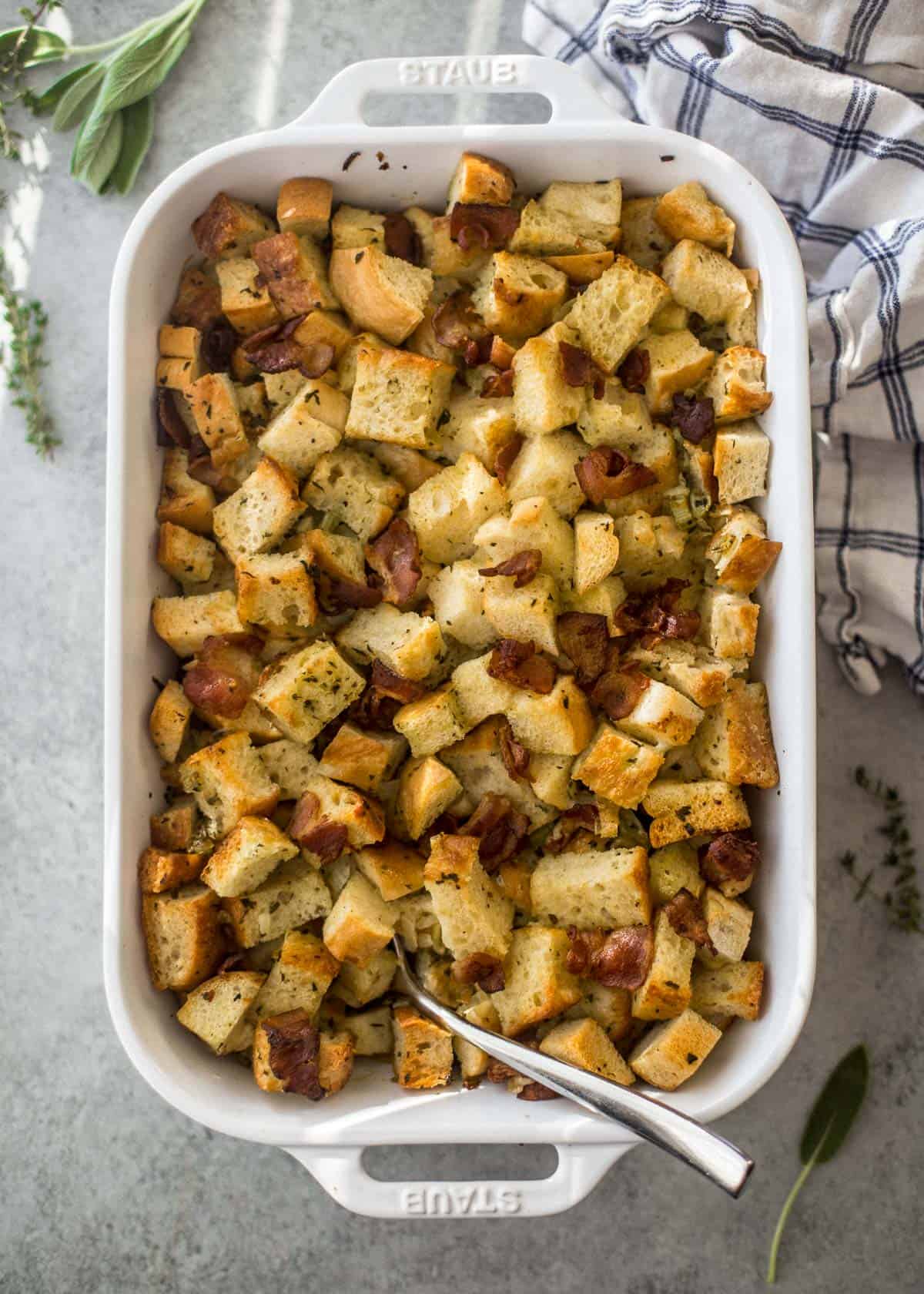 focaccia stuffing in a white baking dish