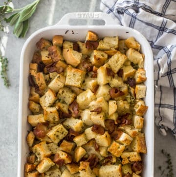 focaccia stuffing in a white baking dish