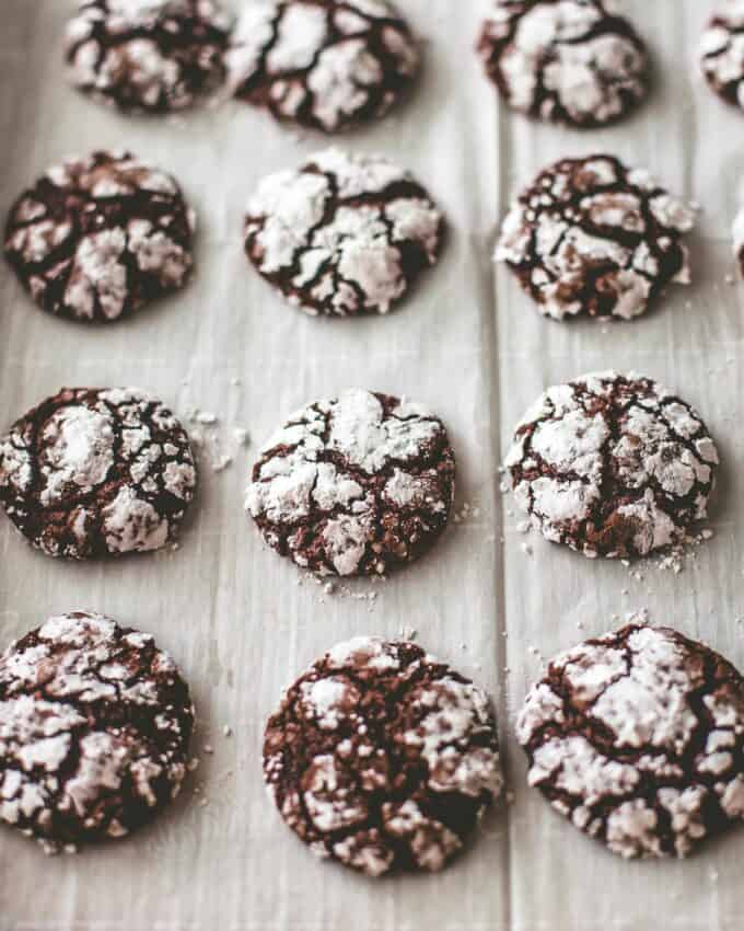 chocolate brownie crackle cookies on a white table