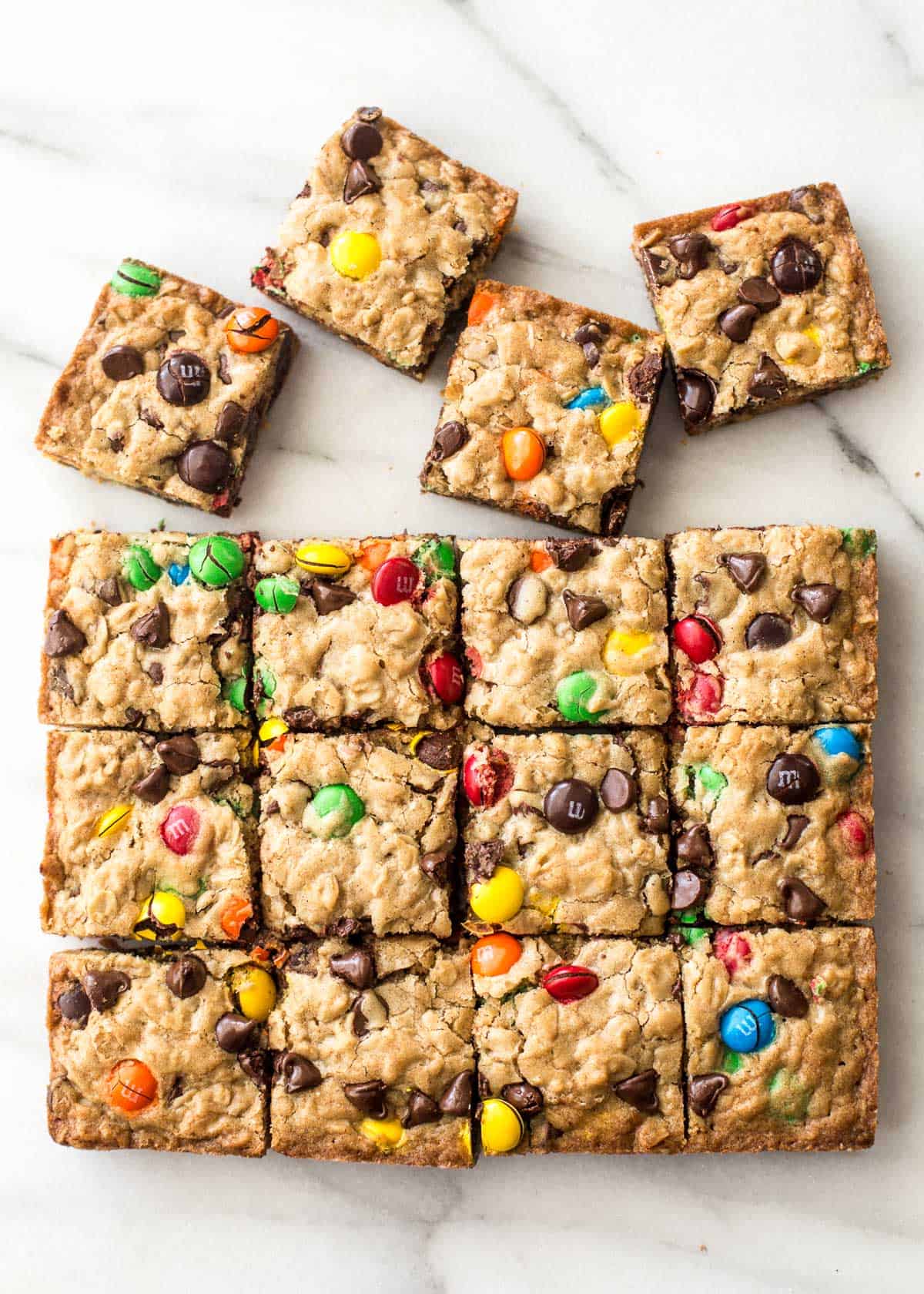 overhead image of oatmeal cookie bars on a white table