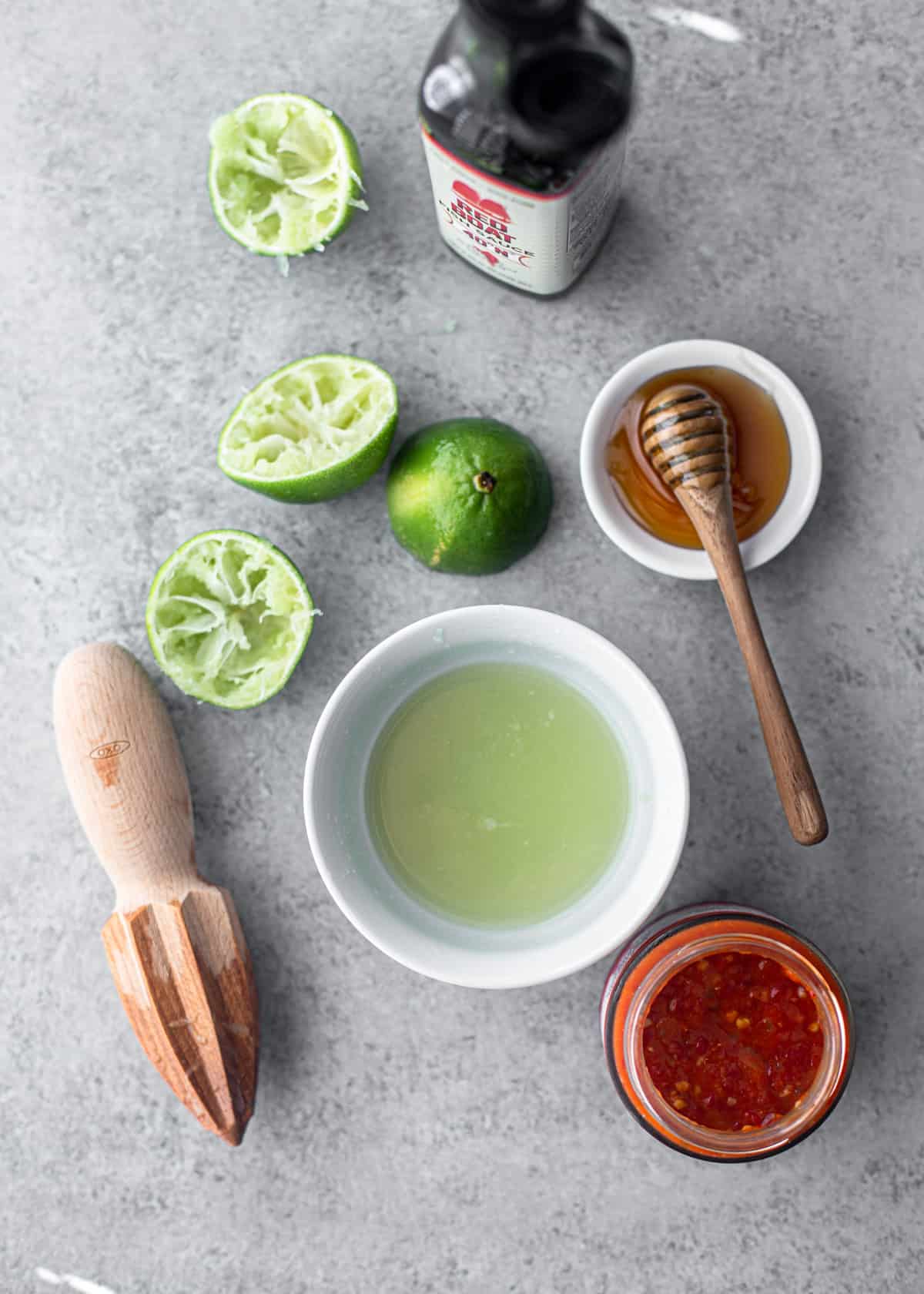 ingredients for pad thai sauce on a grey countertop