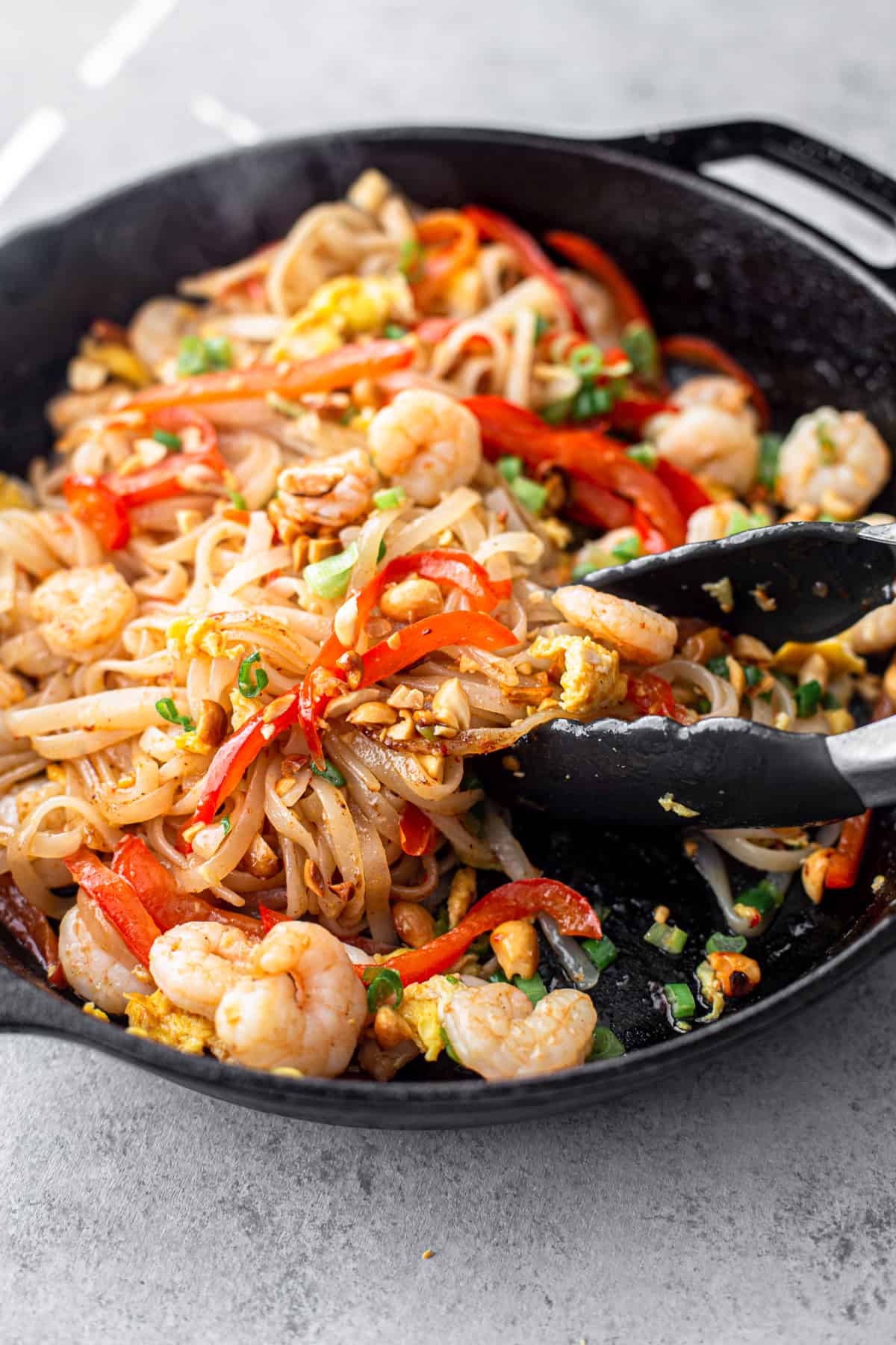 shrimp pad thai in a skillet