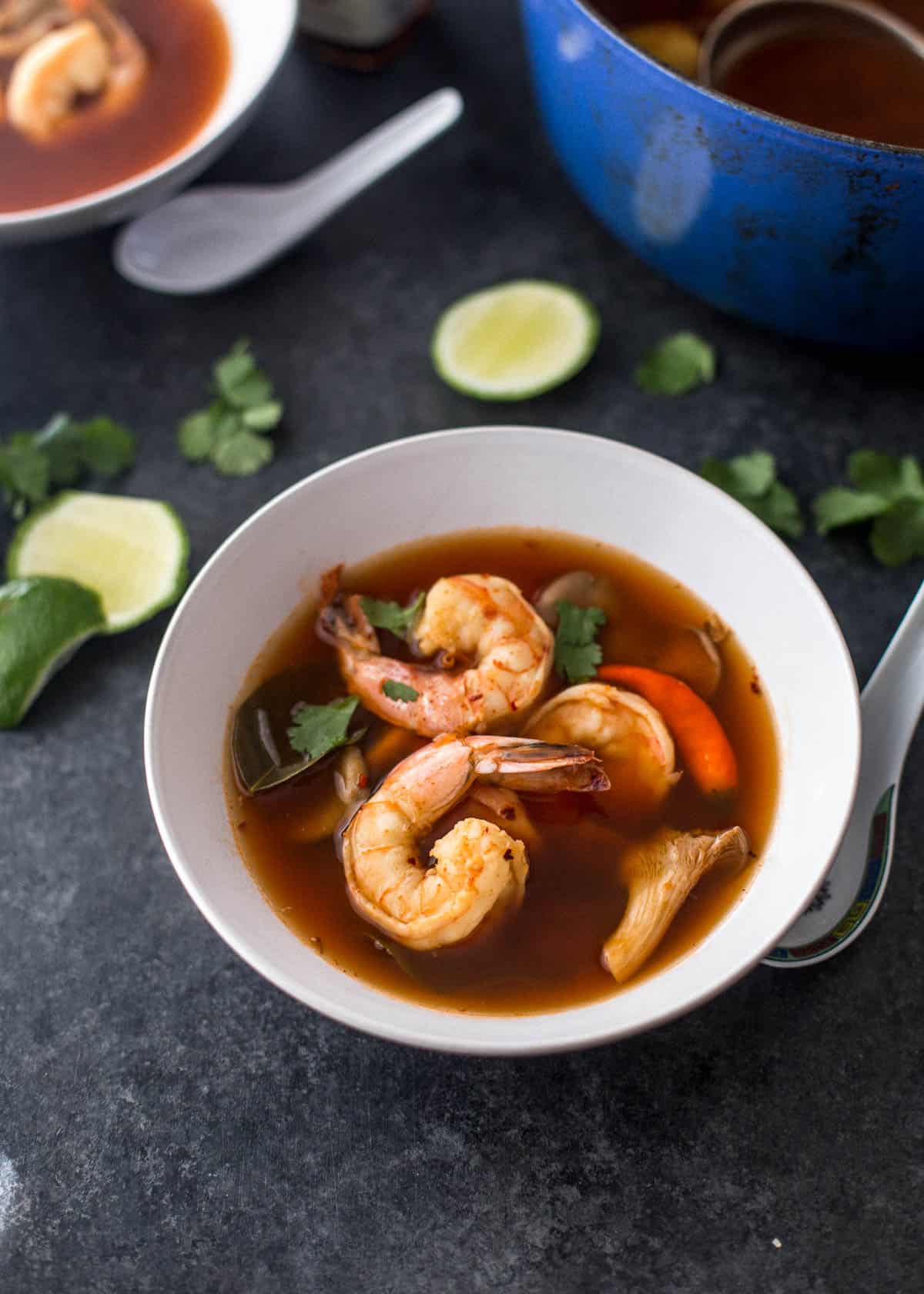 Thai shrimp soup in a white bowl