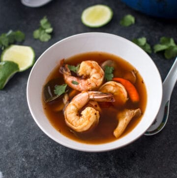 thai shrimp soup in a white bowl