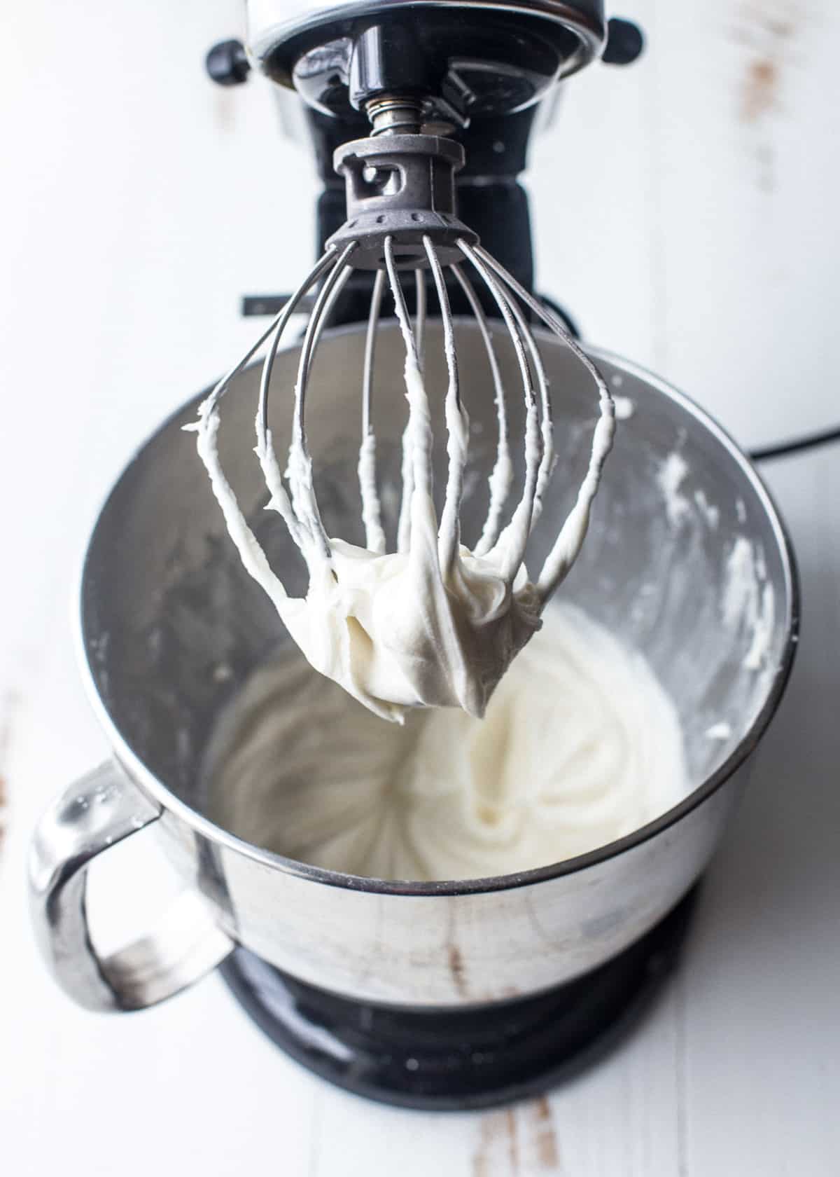 mixing icing for layer cake