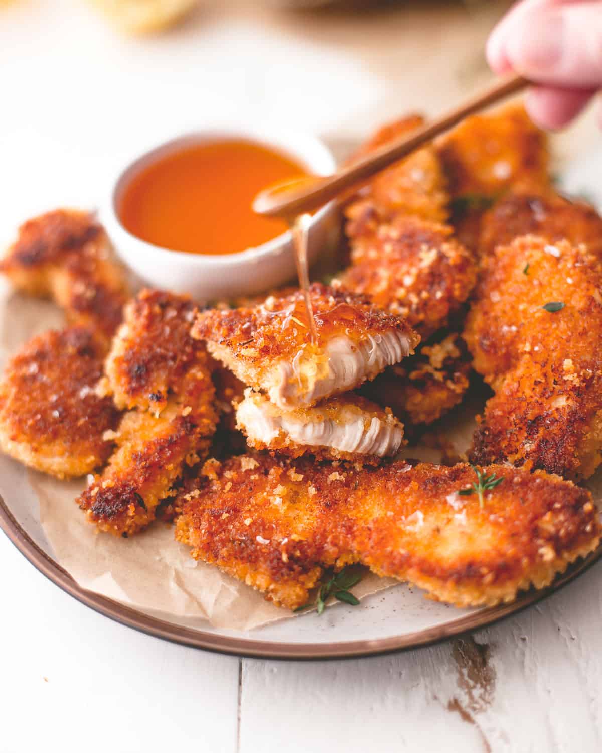 Crispy Baked Chicken Tenders with Hot Honey