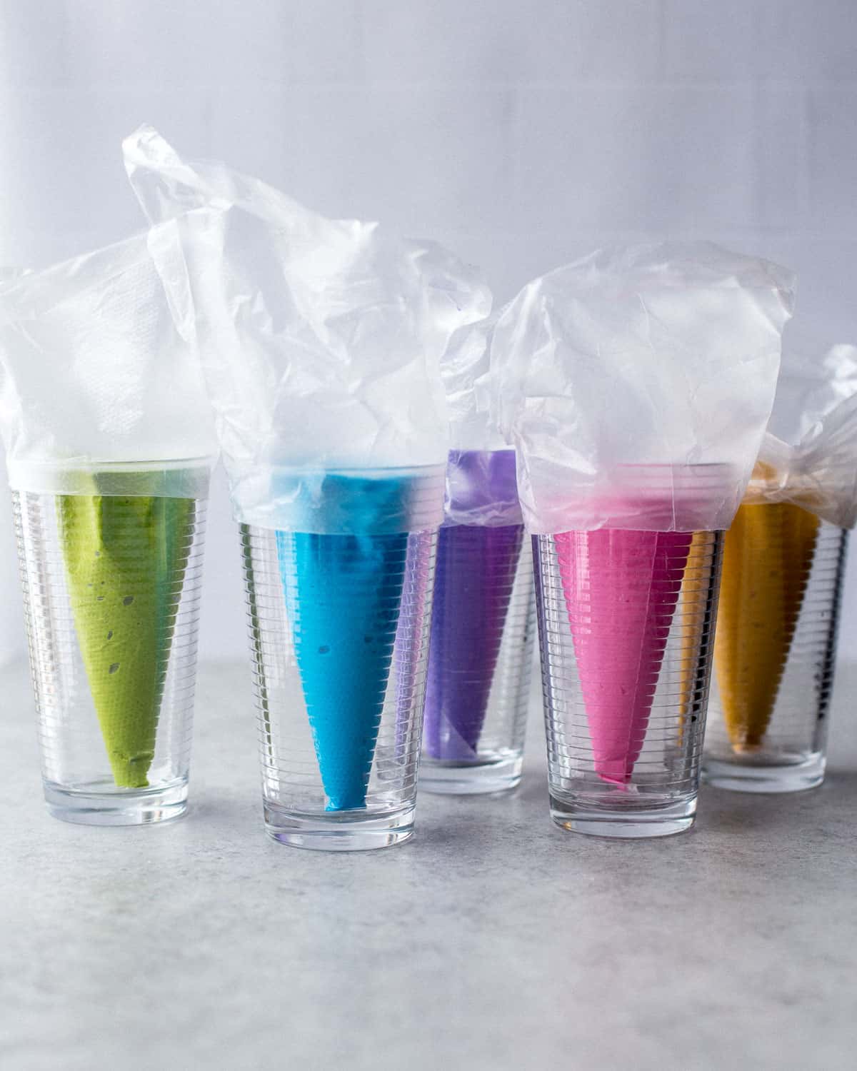 colored icing in piping bags