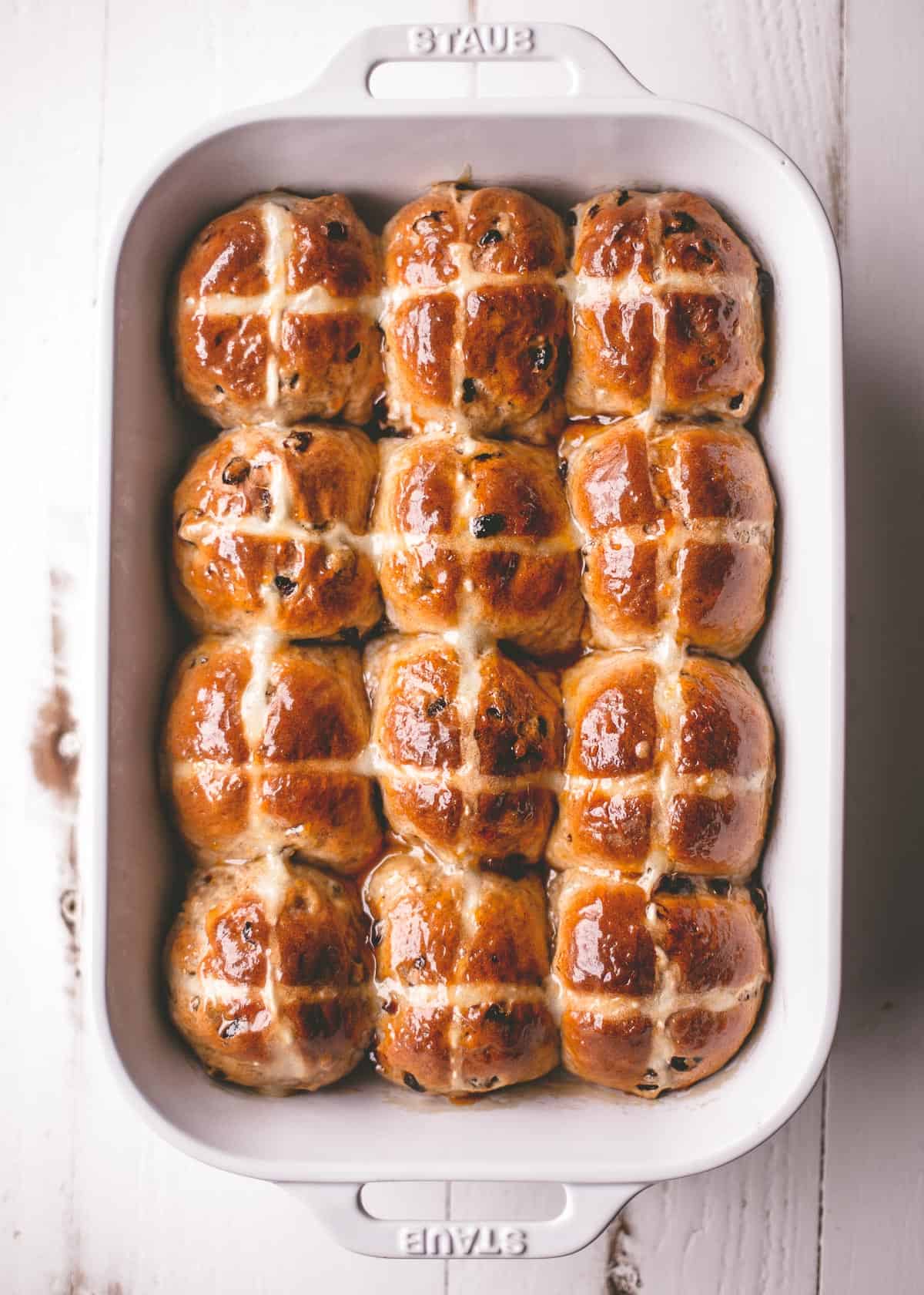 overhead image of buns in a white baking dish