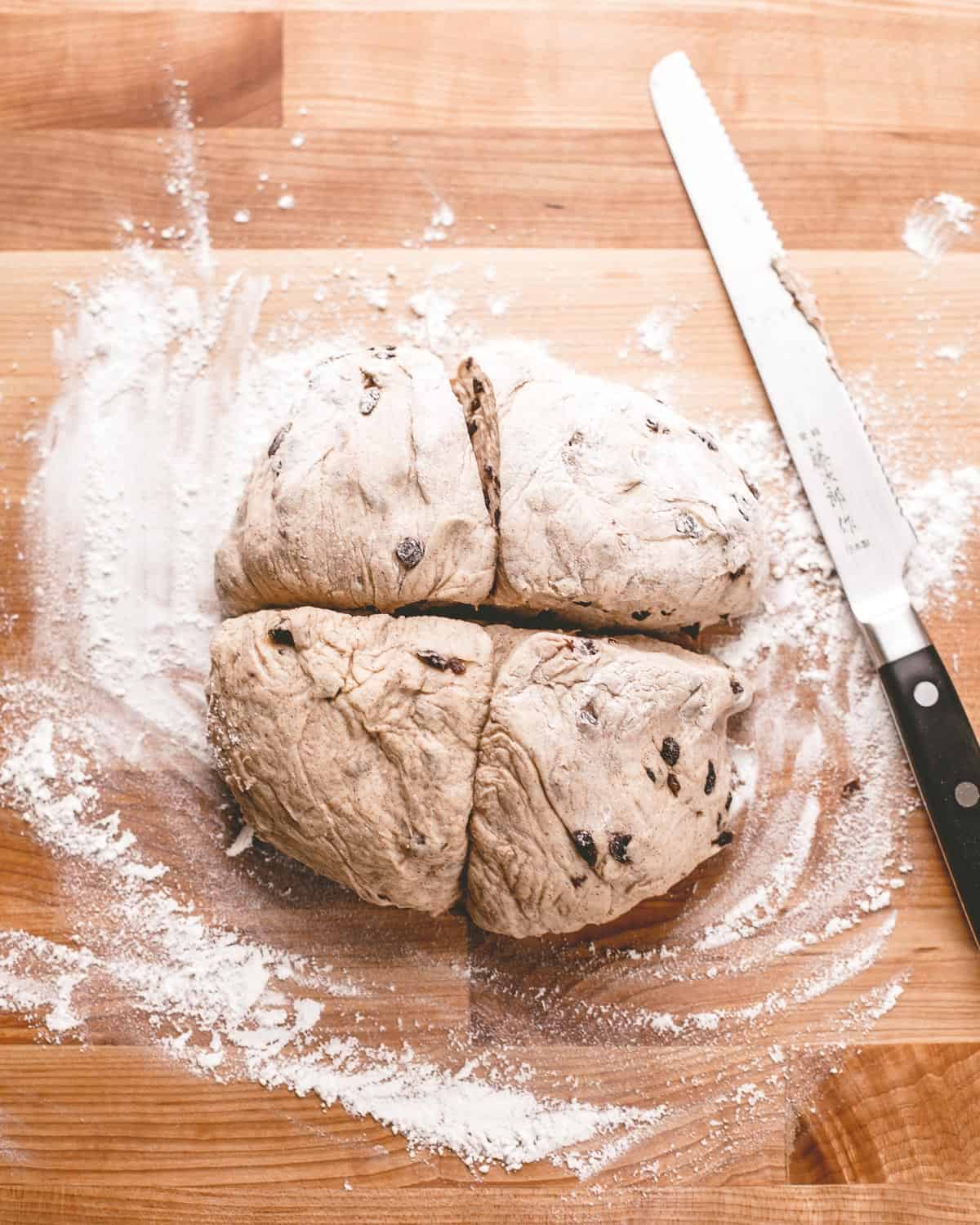 overhead image of dividing dough into fourths